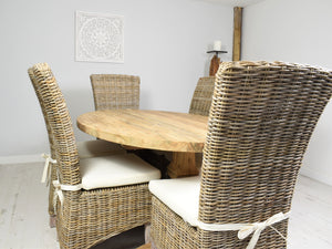 Oval reclaimed teak table and chairs with natural cushion.