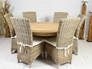 140cm Round reclaimed teak dining table with 6 natural Kabu chairs.
