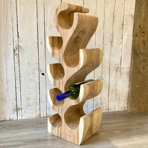 Handcrafted suar wood wine rack for eight bottles