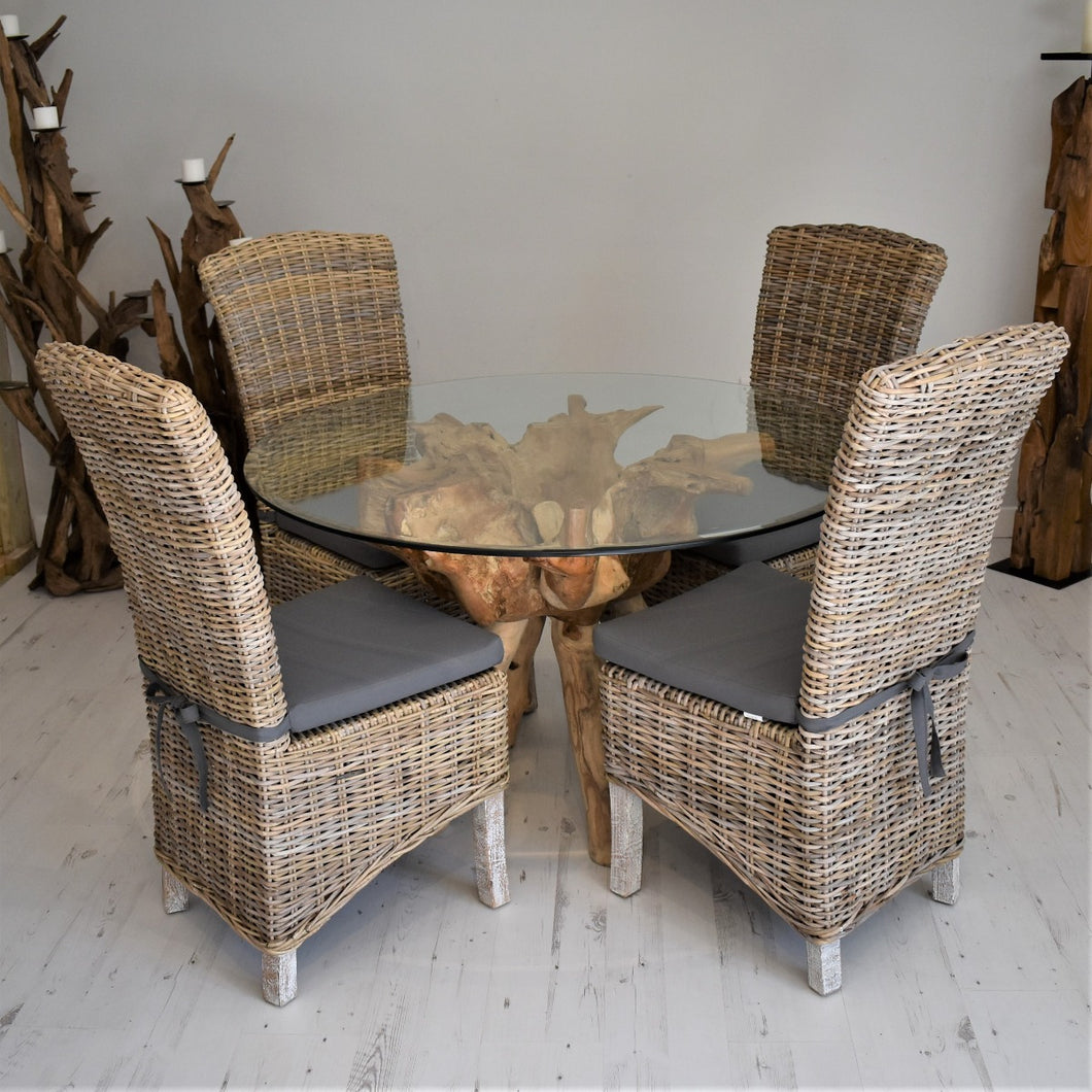 120cm round sustainable teak root dining table paired with 4 wicker dining chairs