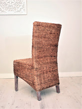 Load image into Gallery viewer, Banana leaf dining chair natural,, back view.