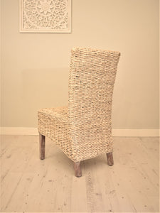 Banana leaf dining chair whitewashed, back view.