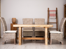 Load image into Gallery viewer, Comfortable whitewash wicker dining chairs are perfect for everyday family use.