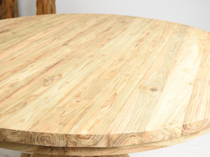 140cm Round reclaimed teak dining table, close up view.