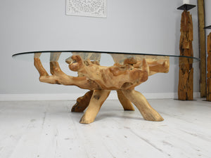 Teak root oval coffee table side view.