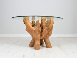 Teak root glass top coffee table side view