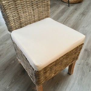 Whitewashed Kabu chair with natural cushion.