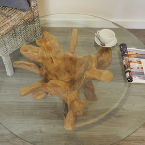Round reclaimed teak root 100cm coffee table, view of the glass top.