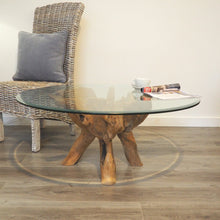 Load image into Gallery viewer, Round reclaimed teak root coffee table side view.