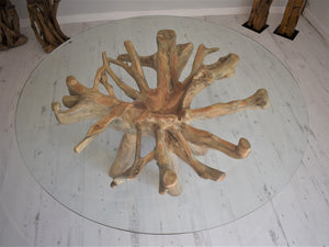 Sustainable teak root dining table with glass top